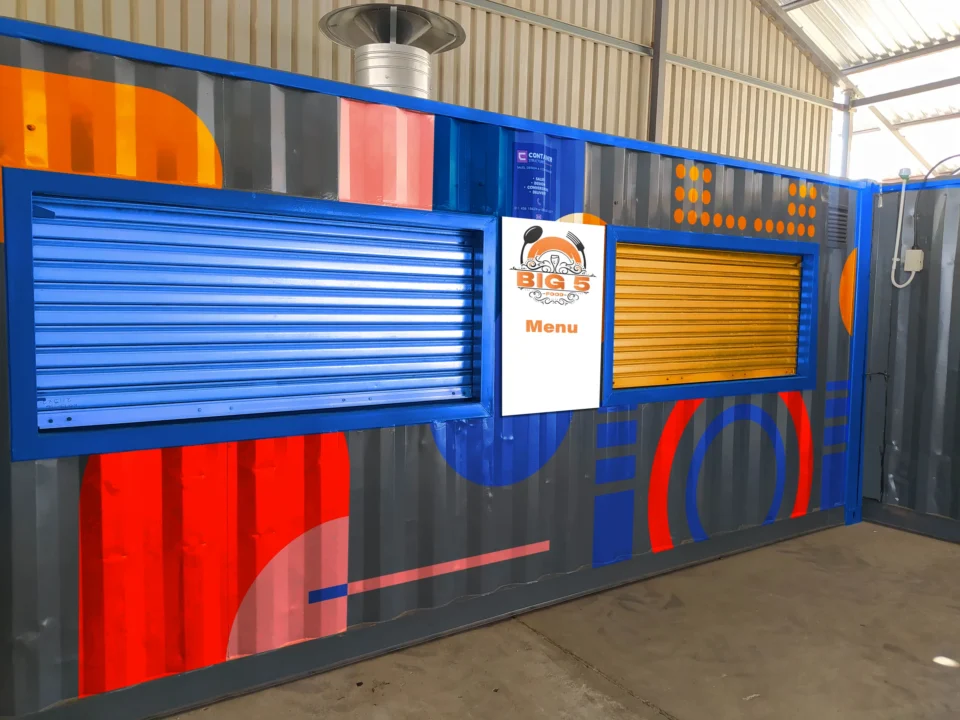 Mural mocked up on the bare containers