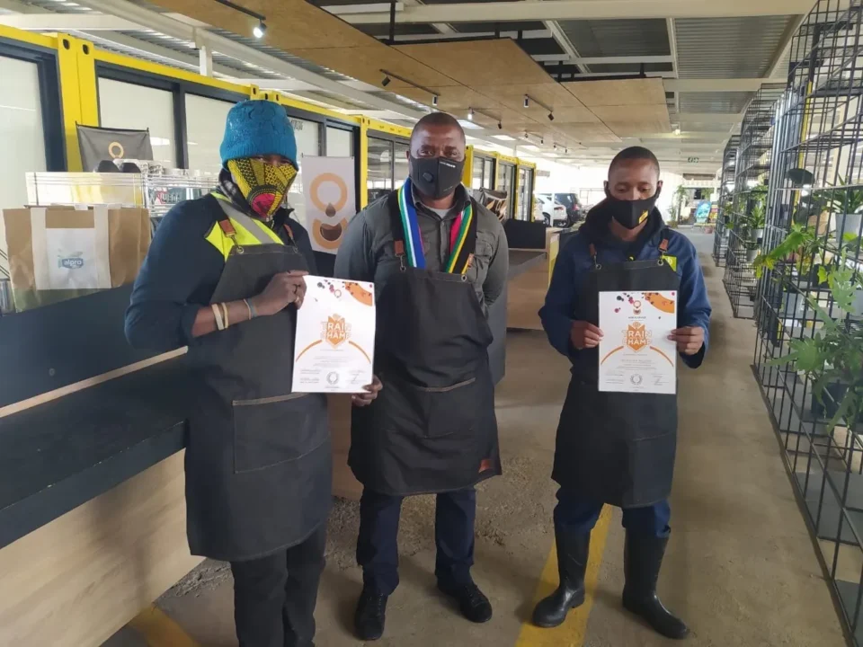 Barista trainees with their certificates